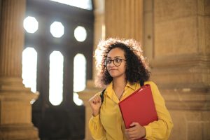 woman holding binder