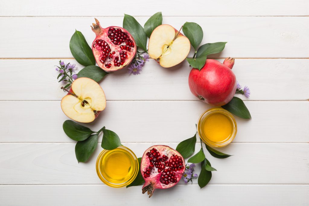 Rosh hashanah concept. Frame made of symbols jewish New Year holiday Traditional. Top view with copy space